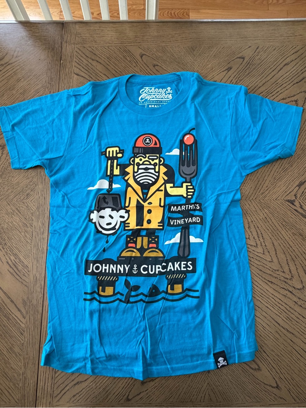 Men’s Johnny Cupcakes “Martha’s Vineyard Fisherman” Tee